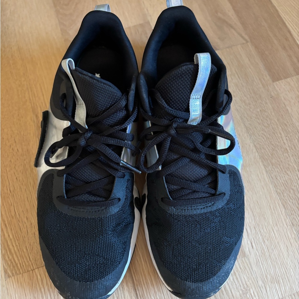 Nike Women's Black Athletic Sneakers with Iridescent Heel Accent